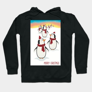 Merry Christmas! Cute Christmas penguins walking in a row on the snow. Hoodie